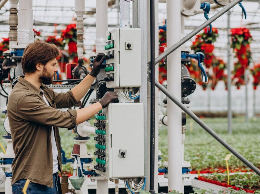 Technician performing PIM testing on telecom tower RF components